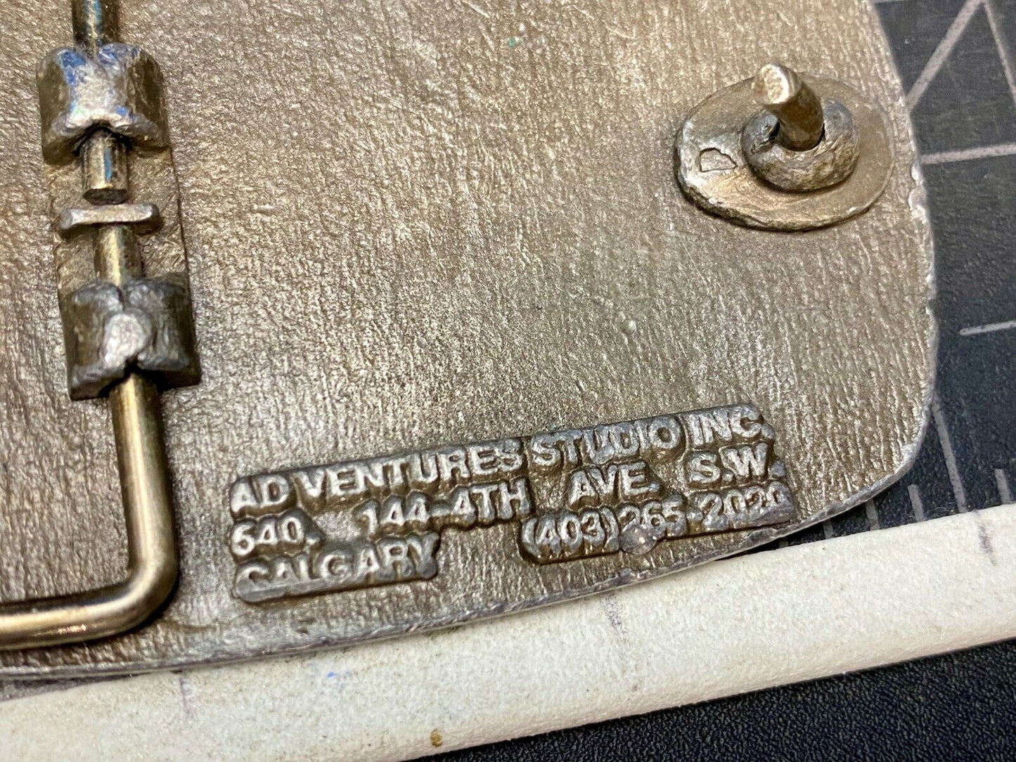 Bi-Provincial Smart Sm Art Upgrader Belt Buckle By Ad Ventures Studios