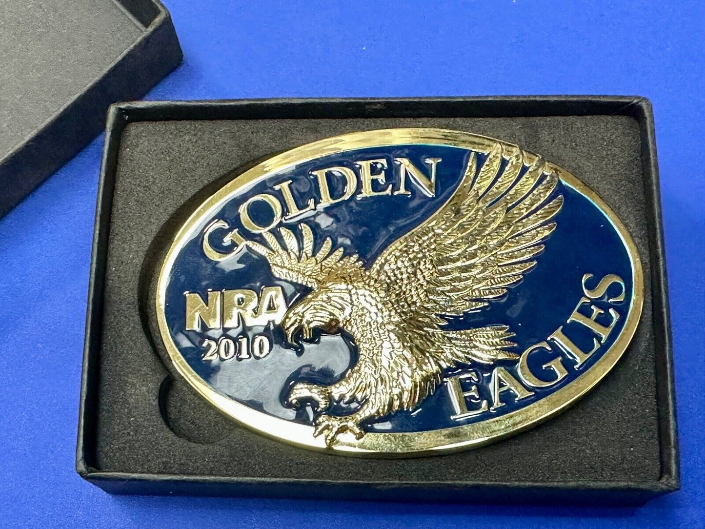 2010 NRA National Rifle Association Golden Eagle blue ribbon belt buckle in box