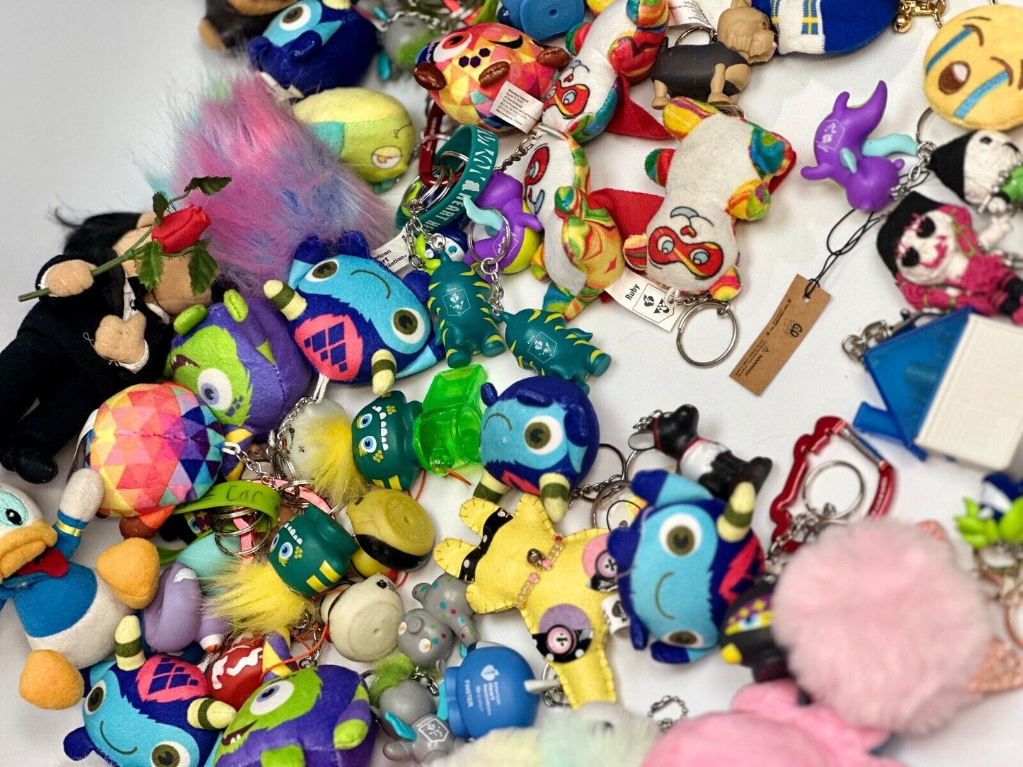 Around 75 plush doll Keychains Resale Bulk Lot, Junk Drawer Grab Bag