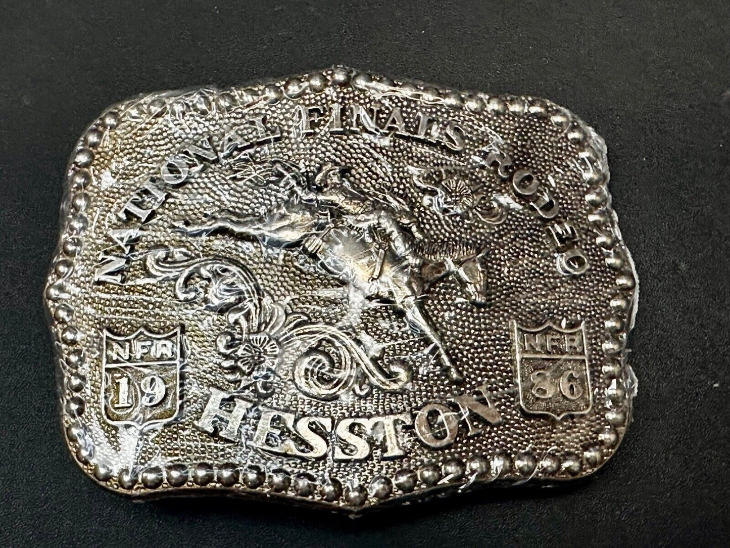 1986 ADULT SIZE NATIONAL FINALS RODEO HESSTION NFR NOS Cowboys Belt Buckle