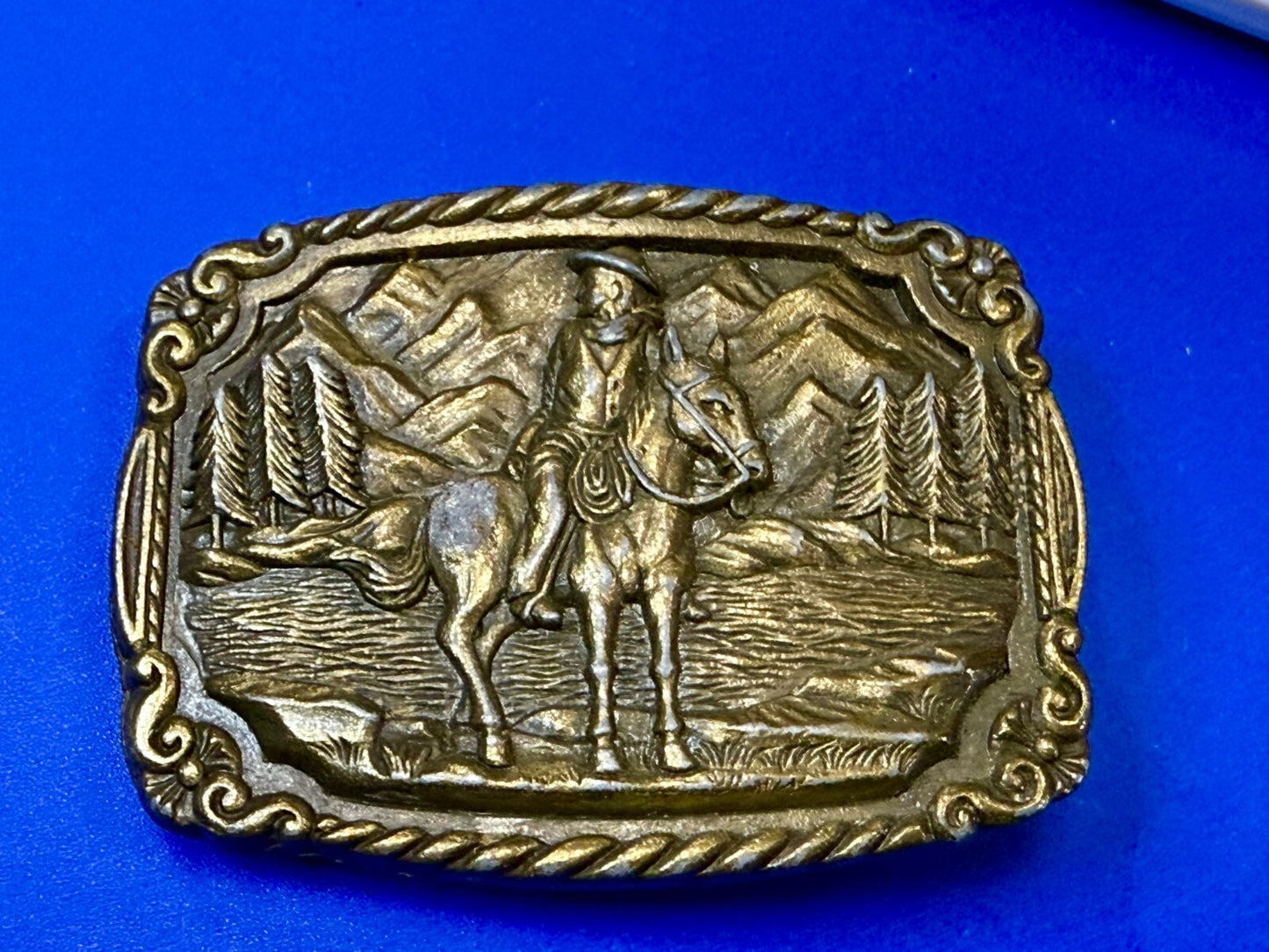 Tall in the Saddle Cowboy Horse River Mountain Scenery Western Belt Buckle