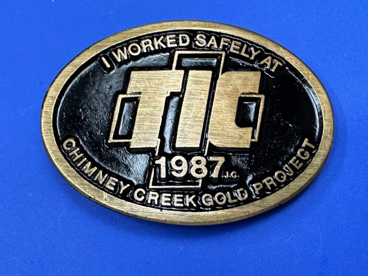 Vintage 1987 TIC Chimney Creek Gold Project Safety award brass belt buckle