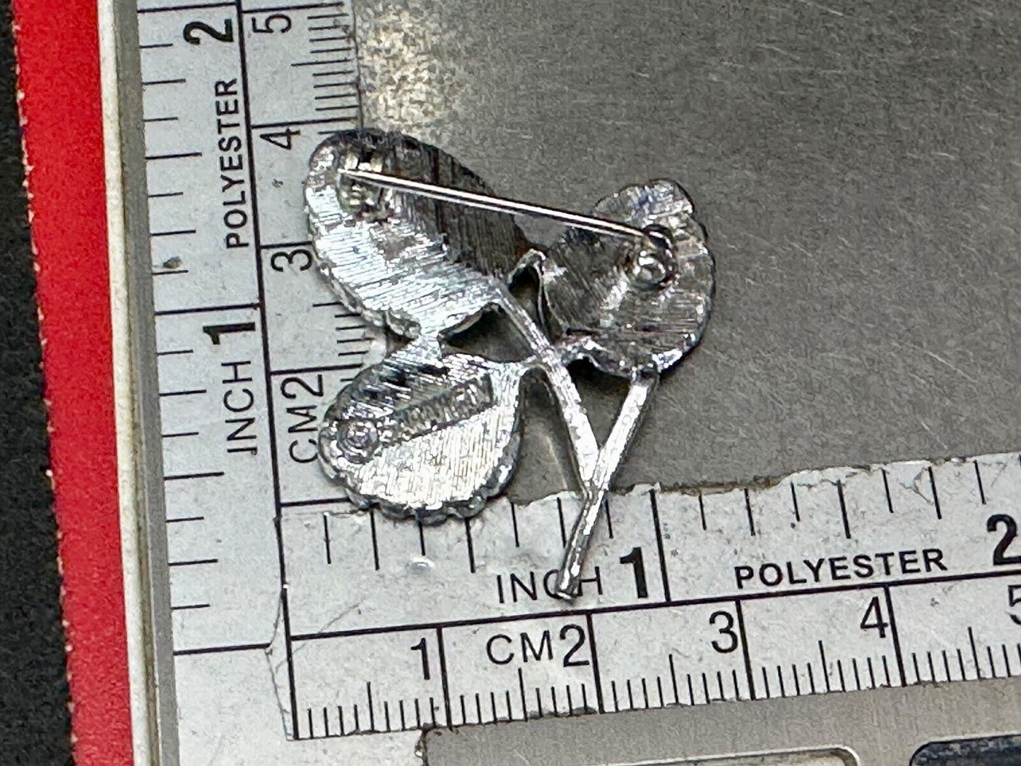 Three Leaf cutout Sarah Coventry signed silver tone brooch pin