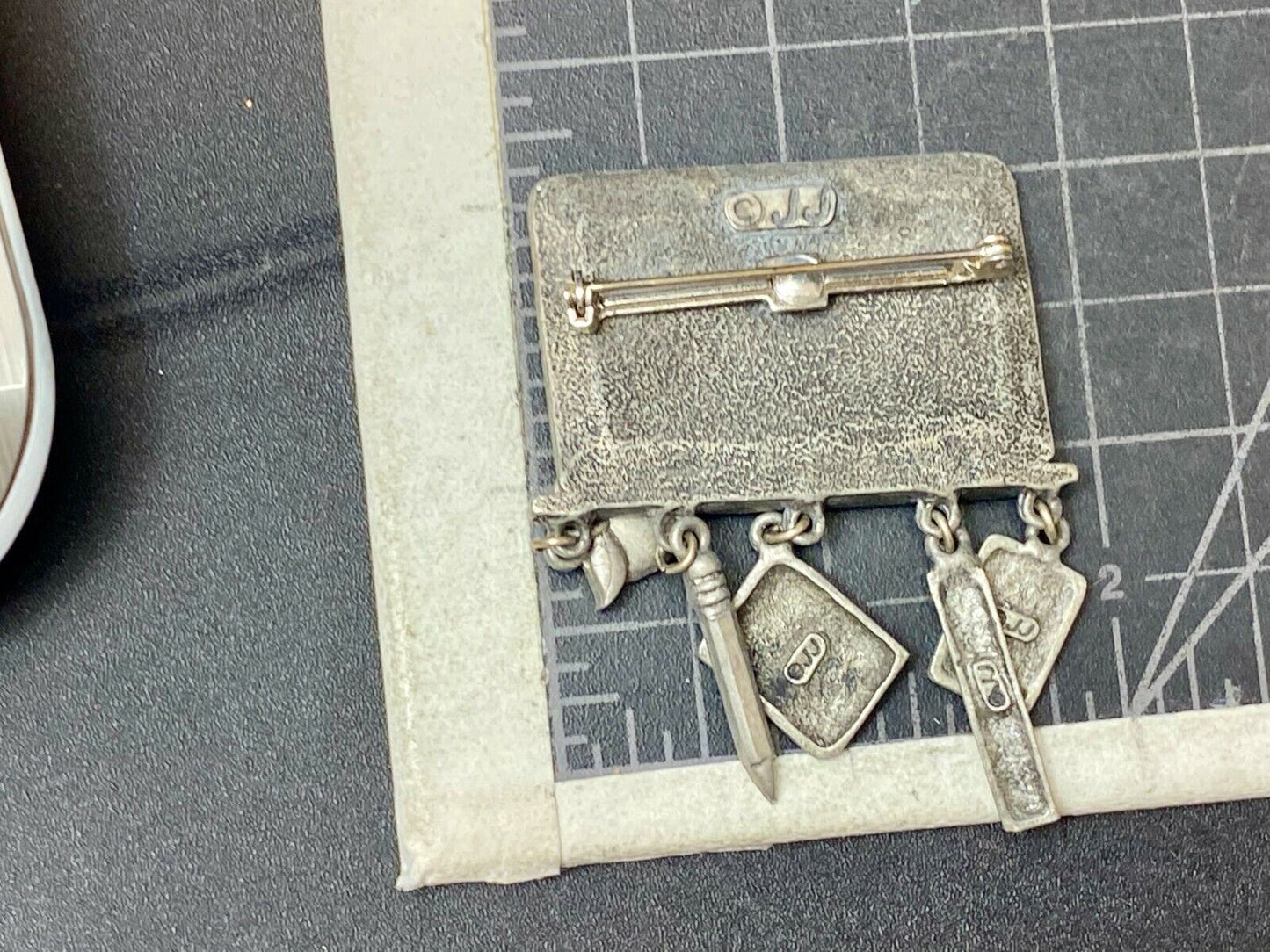 VINTAGE *J.J.*PEWTER MATH TEACHER CHALKBOARD BROOCH PIN W/THEMED FIGURAL DANGLES