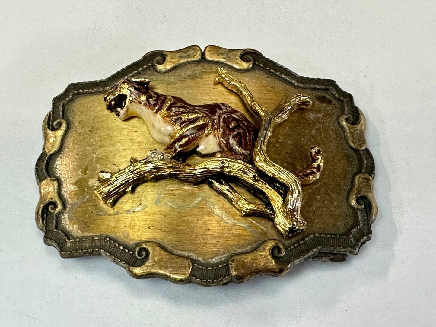 Vintage bobcat? leaping from branch western framed belt buckle by Raintree