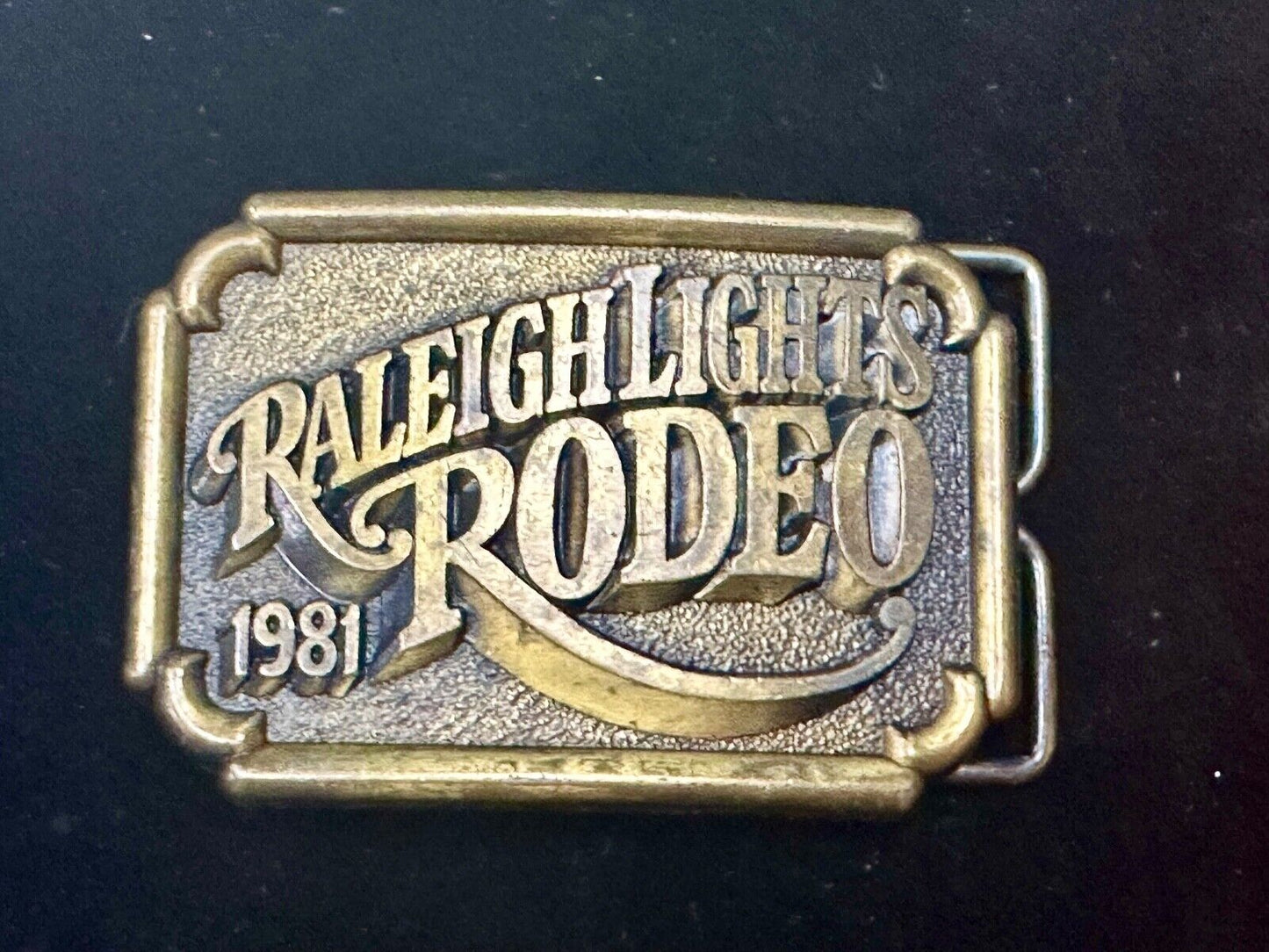 Vintage 1981 Raleigh Lights Rodeo Brass Tone Belt Buckle Advertising Cigarettes