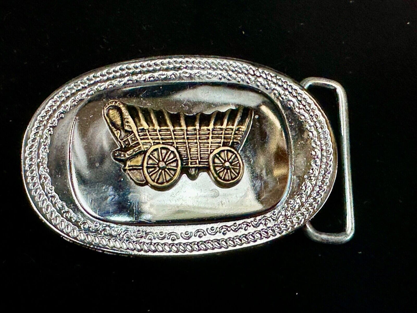 Vintage Covered Wagon on reflective oval two tone western belt buckle