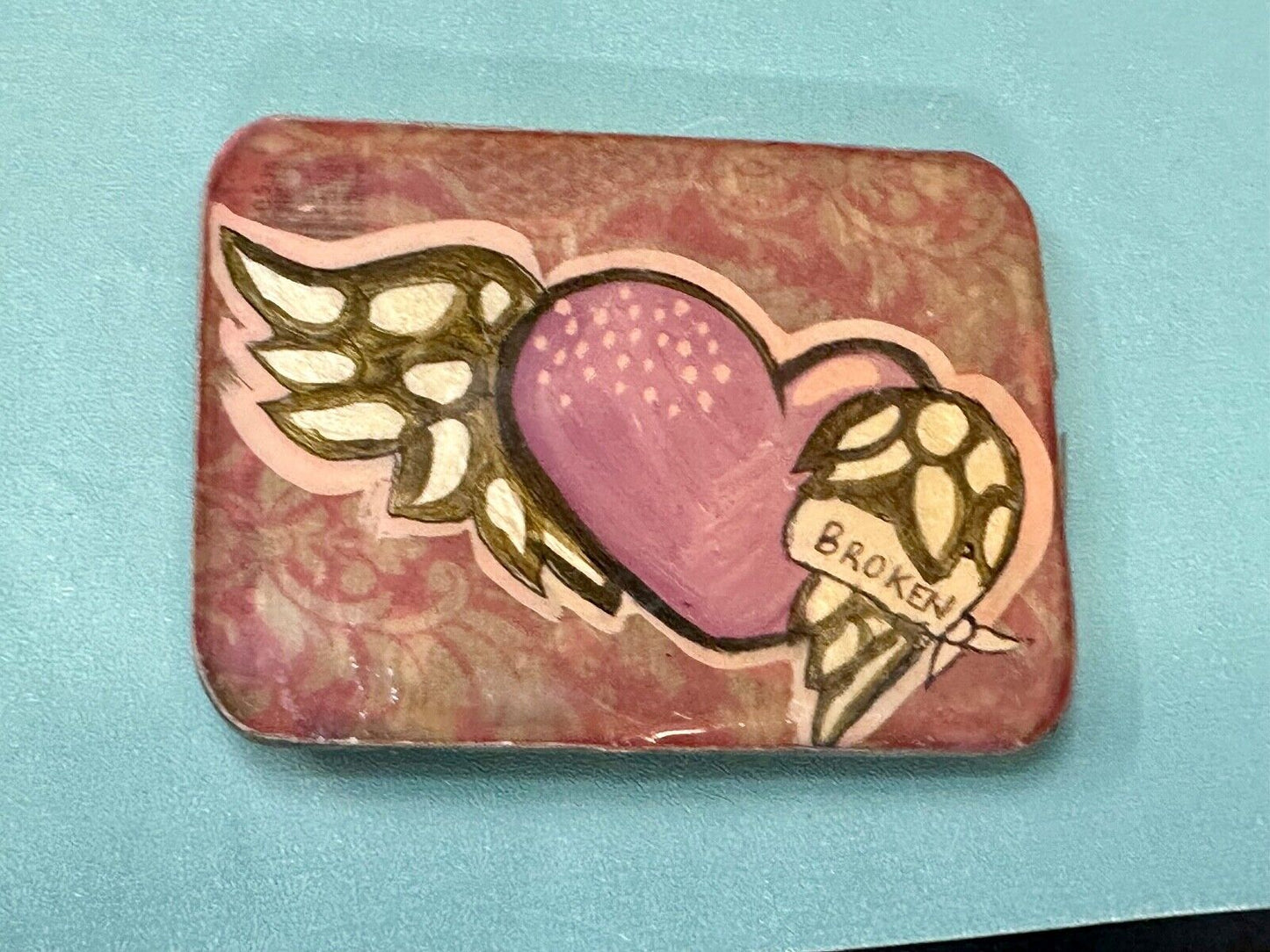 Vintage HEART with wings Mexican Collage belt buckle by artisan Nikki Zabicki