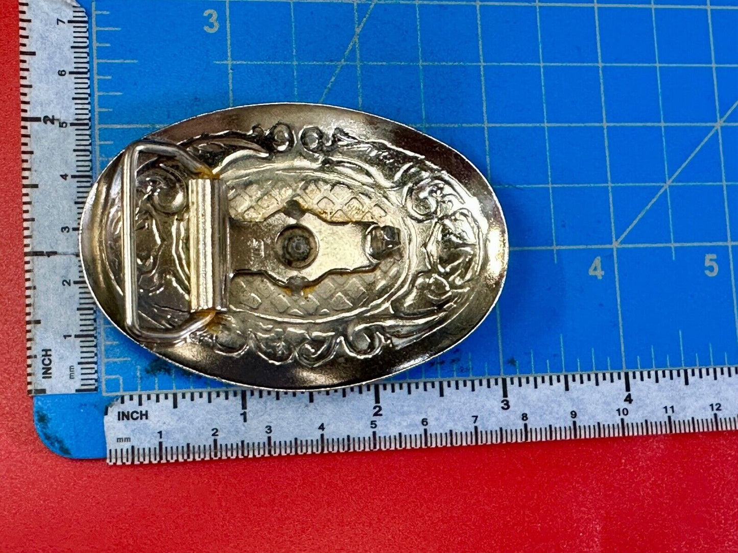vintage Cowboy Boots western theme two tone flower swirl design belt buckle