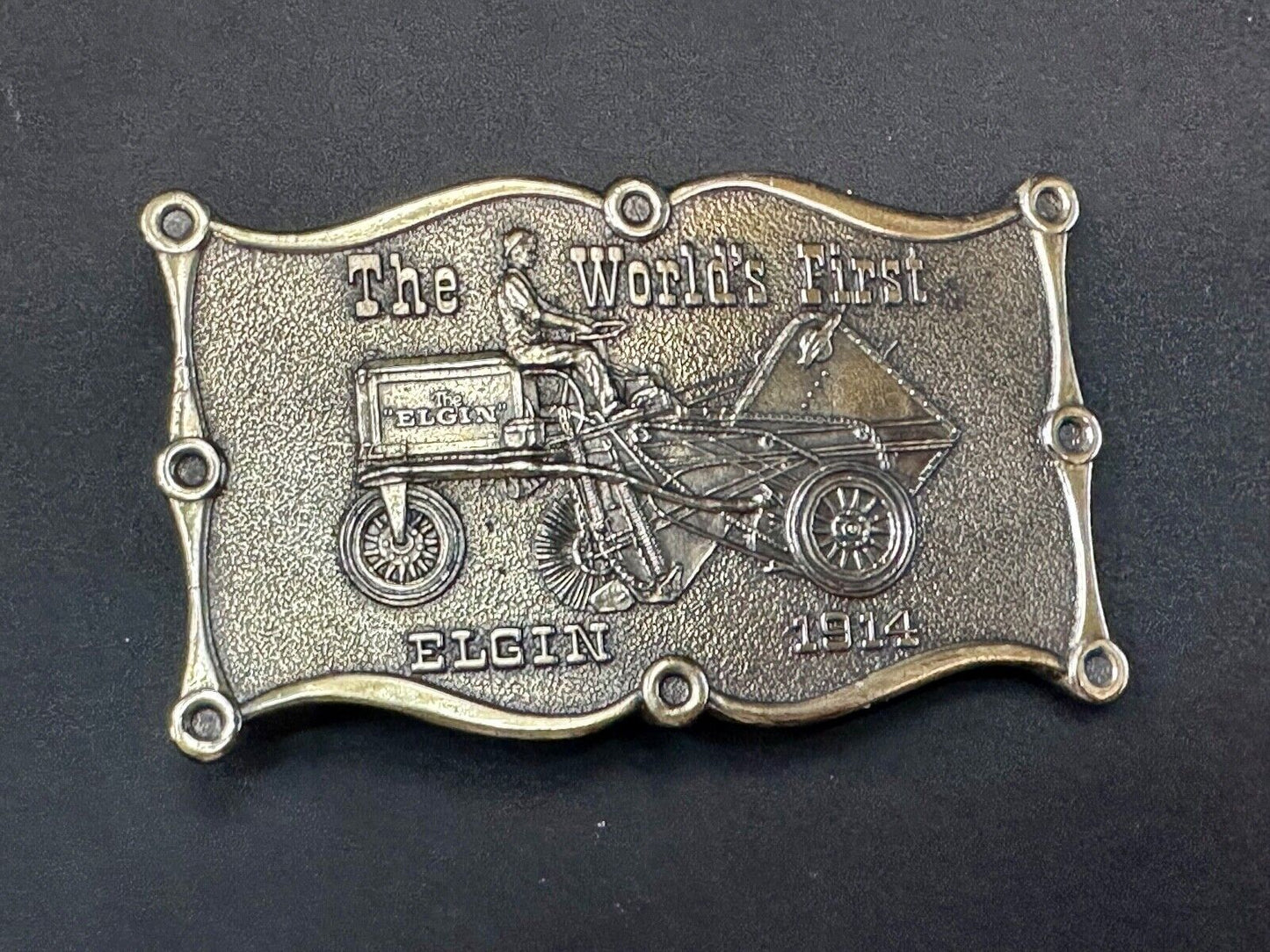The Elgin, The worlds first tree sweeper commemorative belt buckle by Lewis