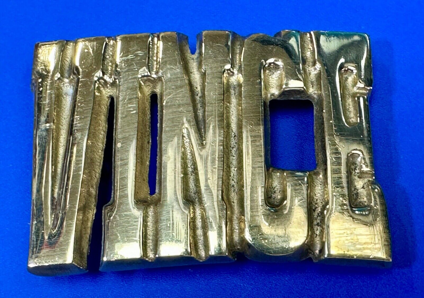 Vince, Cutout block letters solid brass Vintage belt buckle marked Taiwan ROC