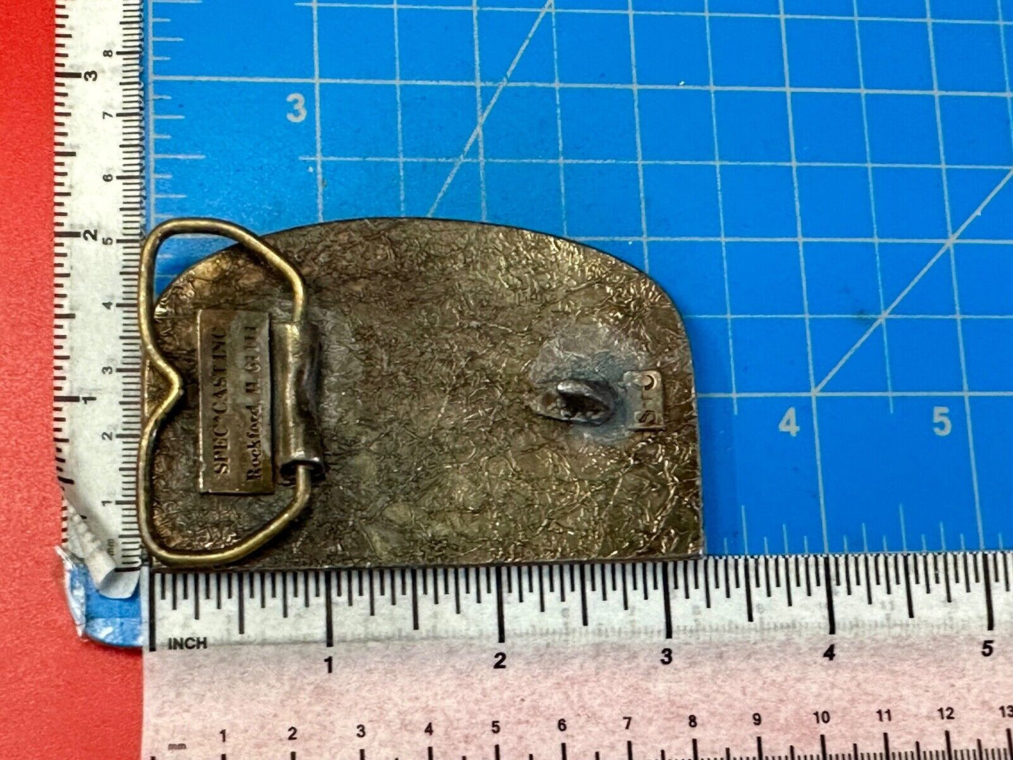 The Tough Tire Team BRi Brad Ragan, Inc. vintage belt buckle by Spec-Cast
