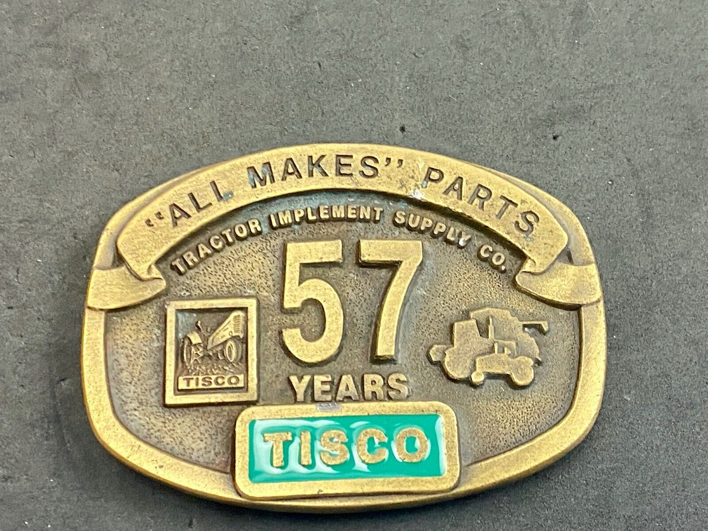 Tisco Tractor Implement Supply 57 years Spec Cast Brass Belt Buckle series 5