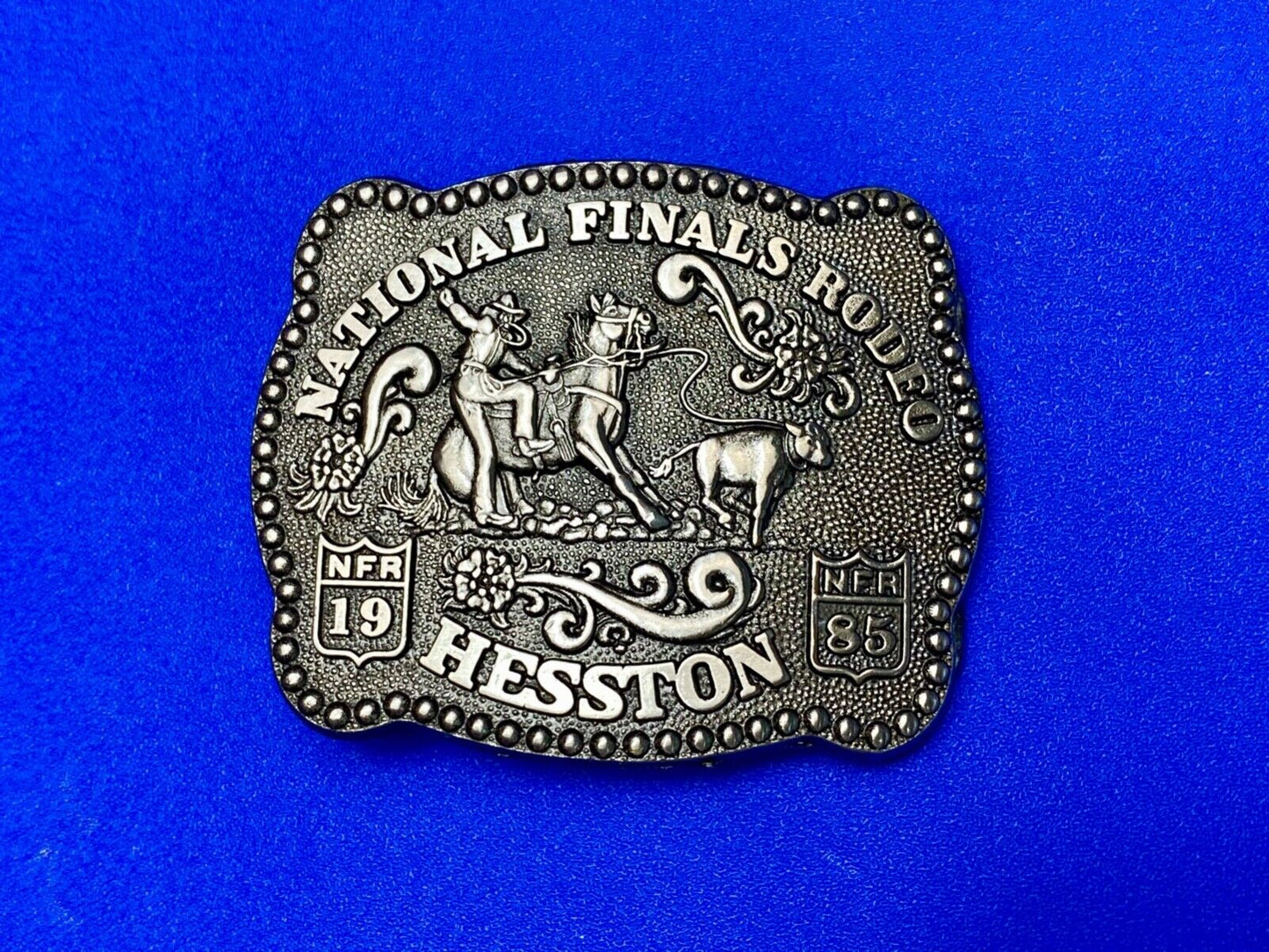 1985 Hesston YOUTH size Nation Finals Rodeo NFR Cowboy belt buckle