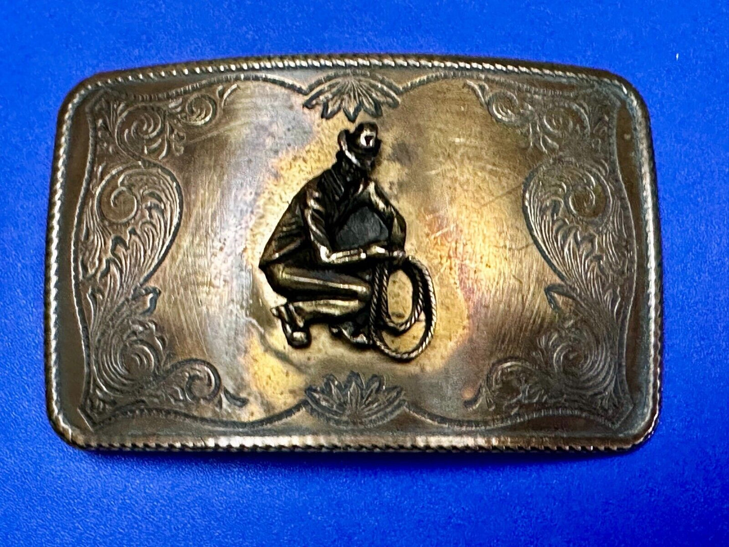Vintage Cowboy Kneeling With Rodeo Lasso Rope Western Belt Buckle
