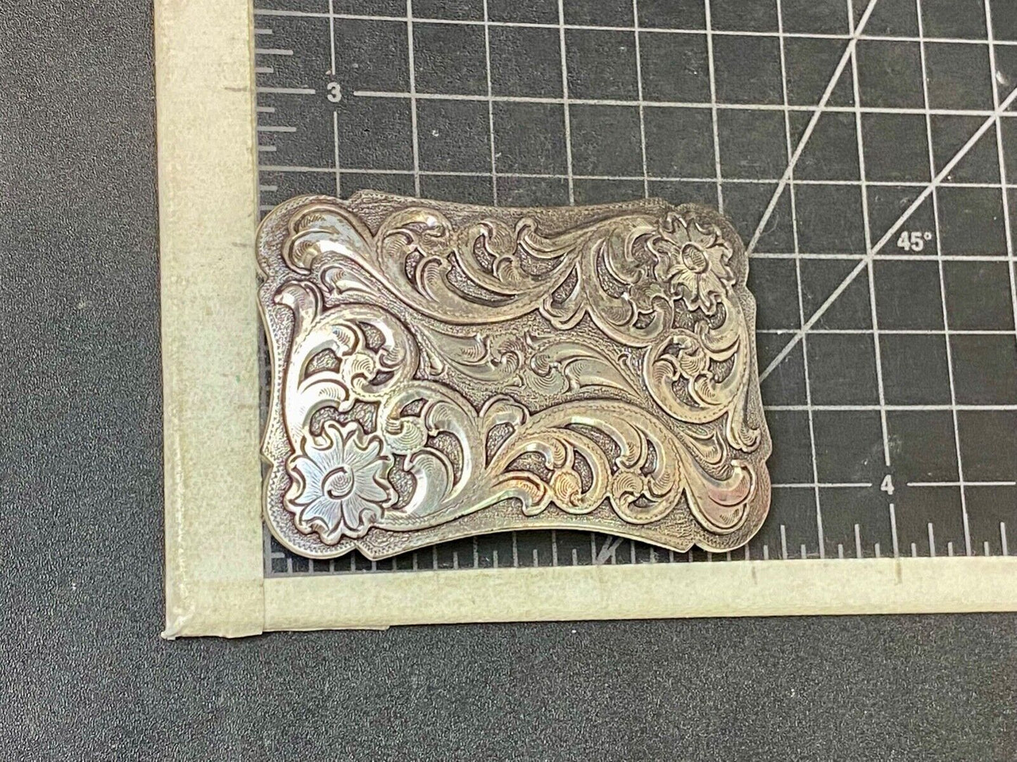 Thick flower swirl silver color western belt buckle