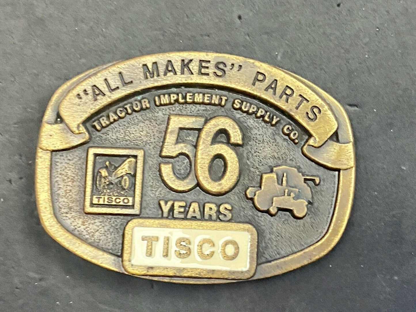 TISCO 56 Years ALL MAKES PARTS Tractor Service belt buckle Series 4 1993
