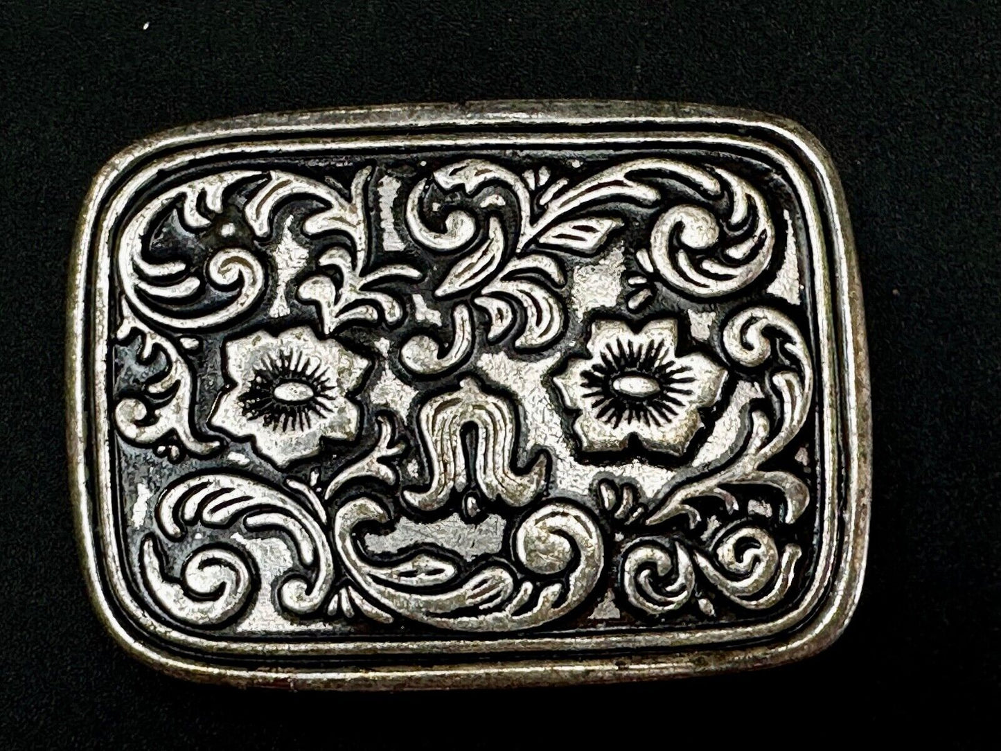 Vintage black and silver tone western flower floral theme cowboys belt buckle