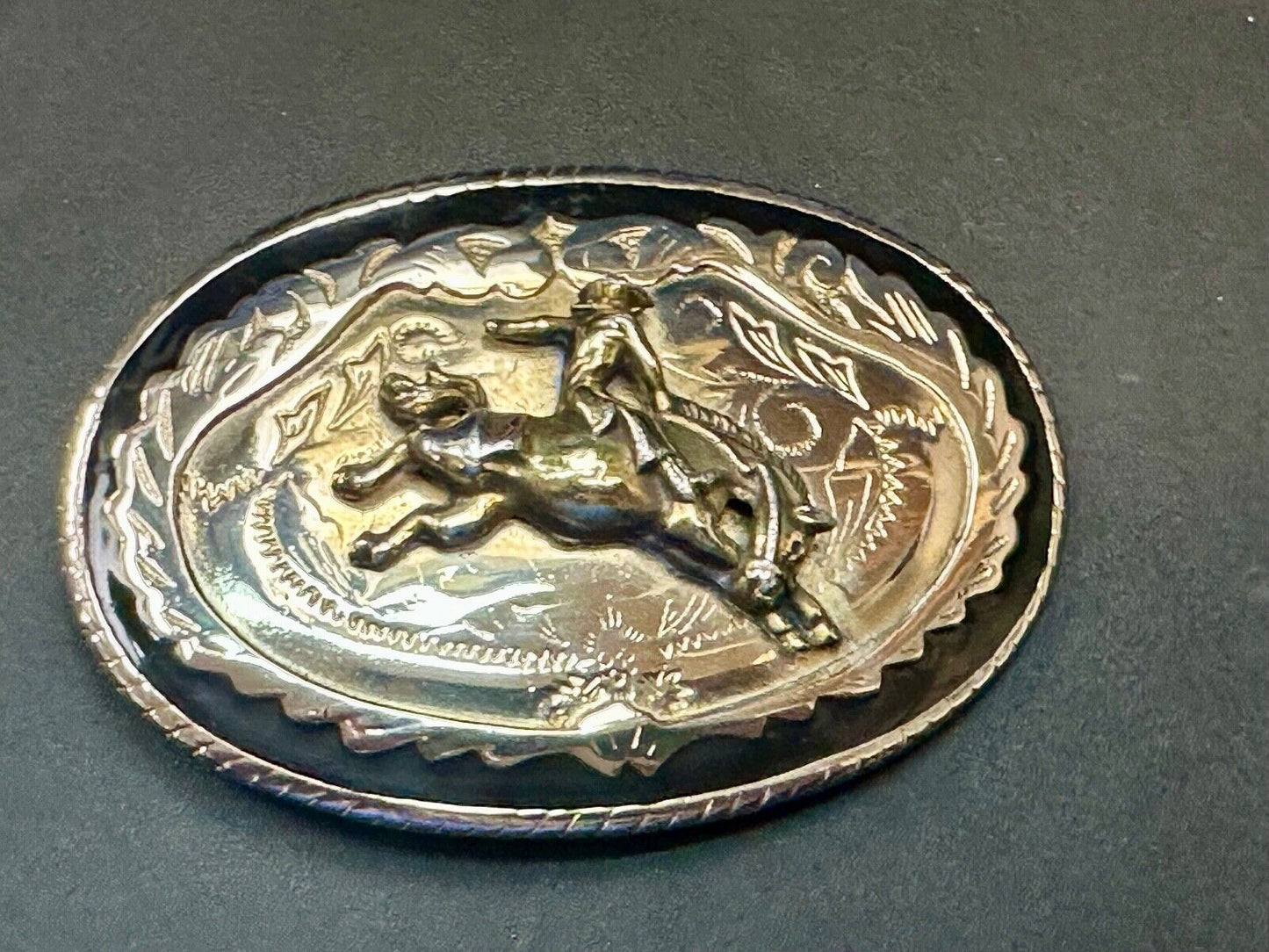 Beautiful Cowboy Saddle Bronc western black silver gold color belt buckle