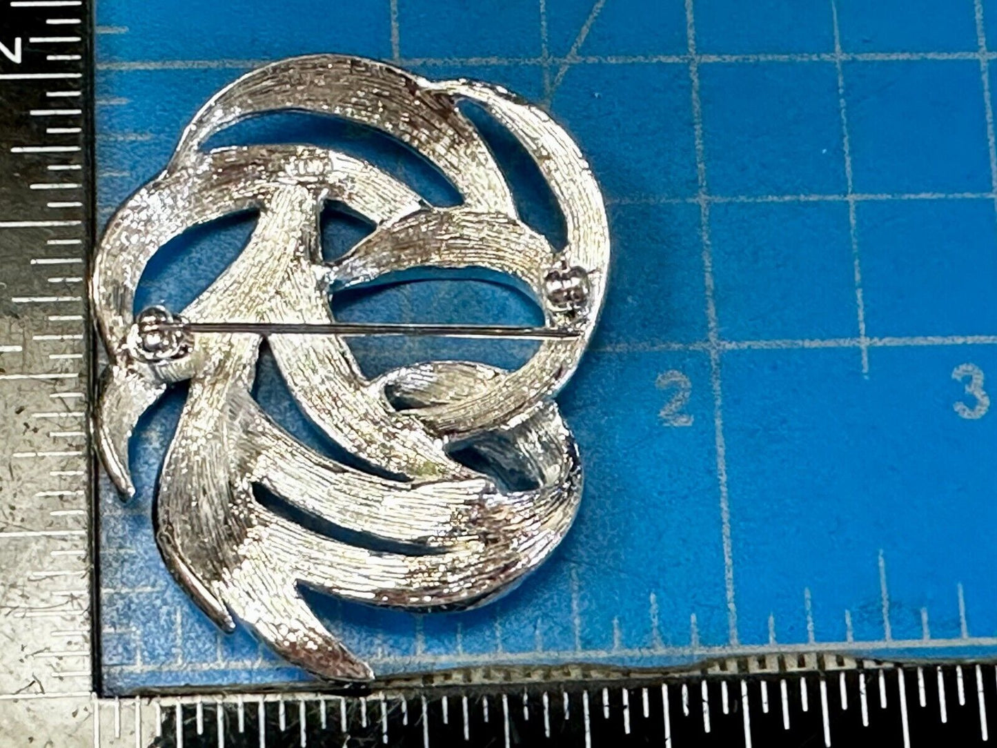 Swirled Curled Silver Tone Vintage Brooch Pin Signed Monet