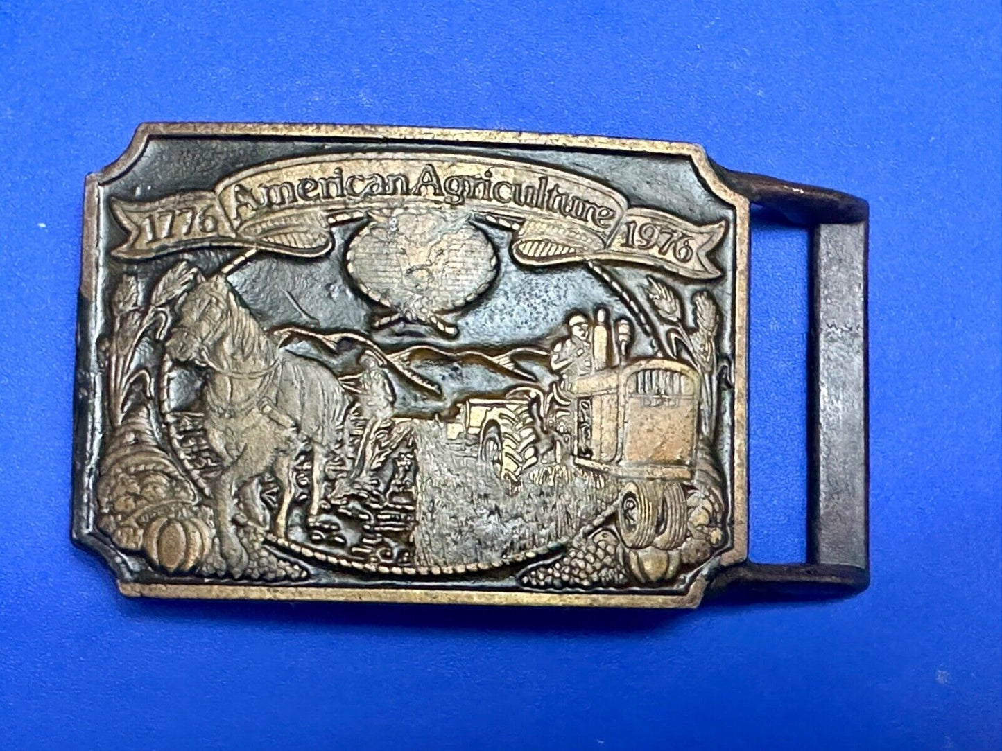 Bicentennial American Agriculture Horse to tractor, Vtg belt buckle by Ortho