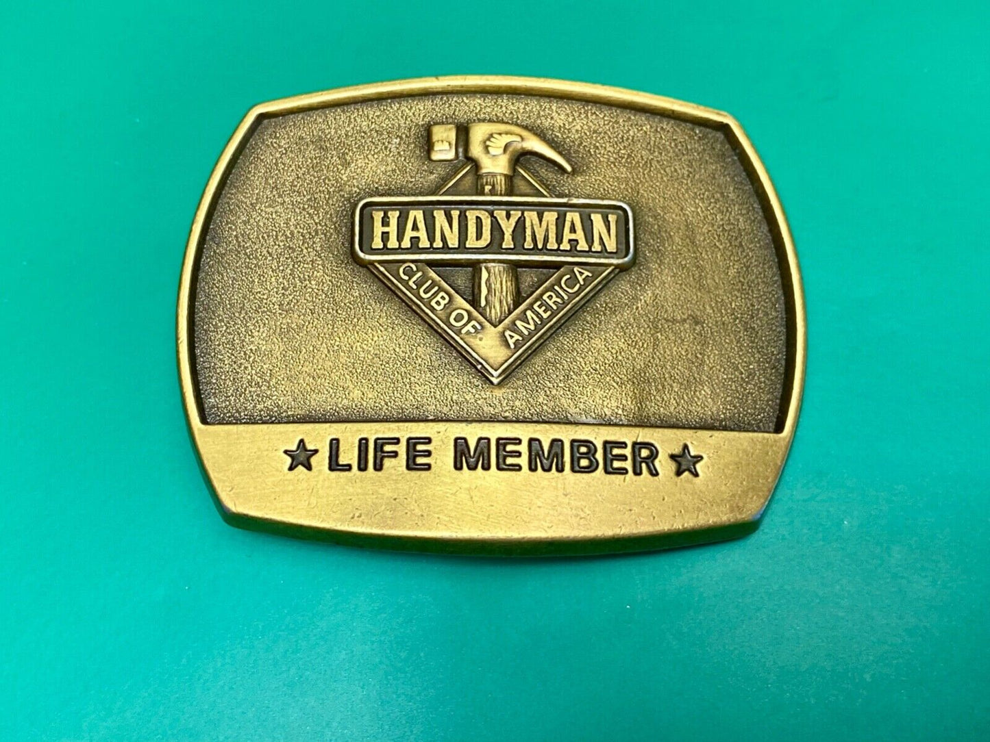 vintage handyman club of America Hammer Ruler- life member belt buckle
