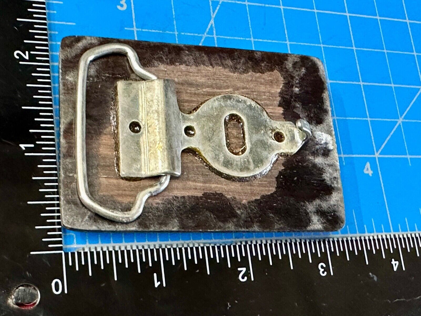 Artisan wood belt buckle with small inlaid sand dollar sea shell