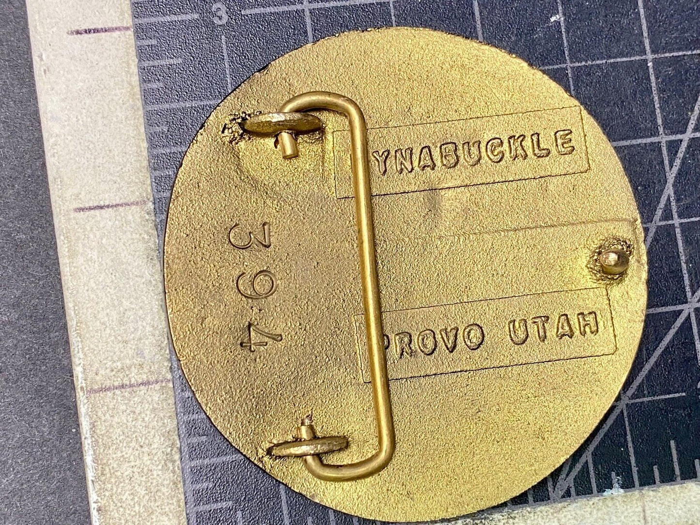 Astralloy Vis a unique, deep-air hardened steel promotional brass belt buckle