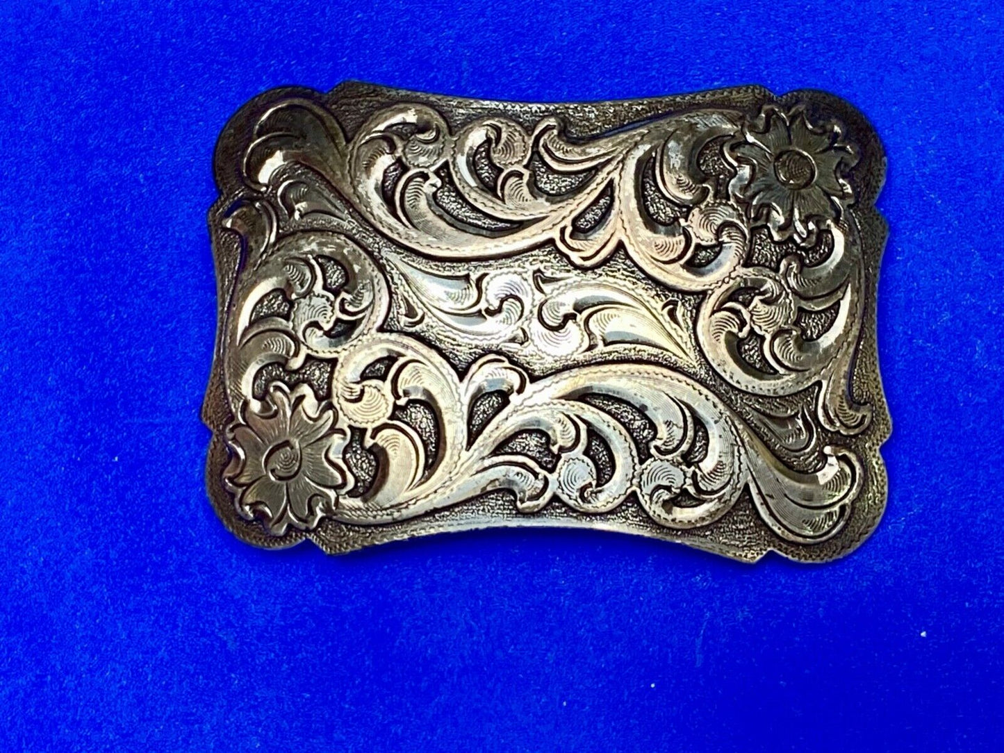 Thick flower swirl silver color western belt buckle