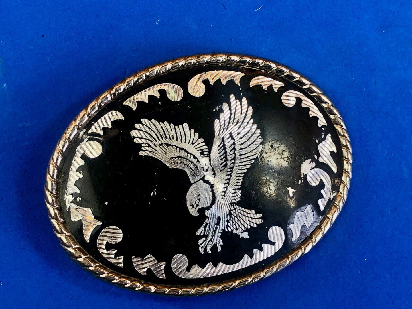 Black and silver color western belt buckle soaring eagle flying hunting diving w