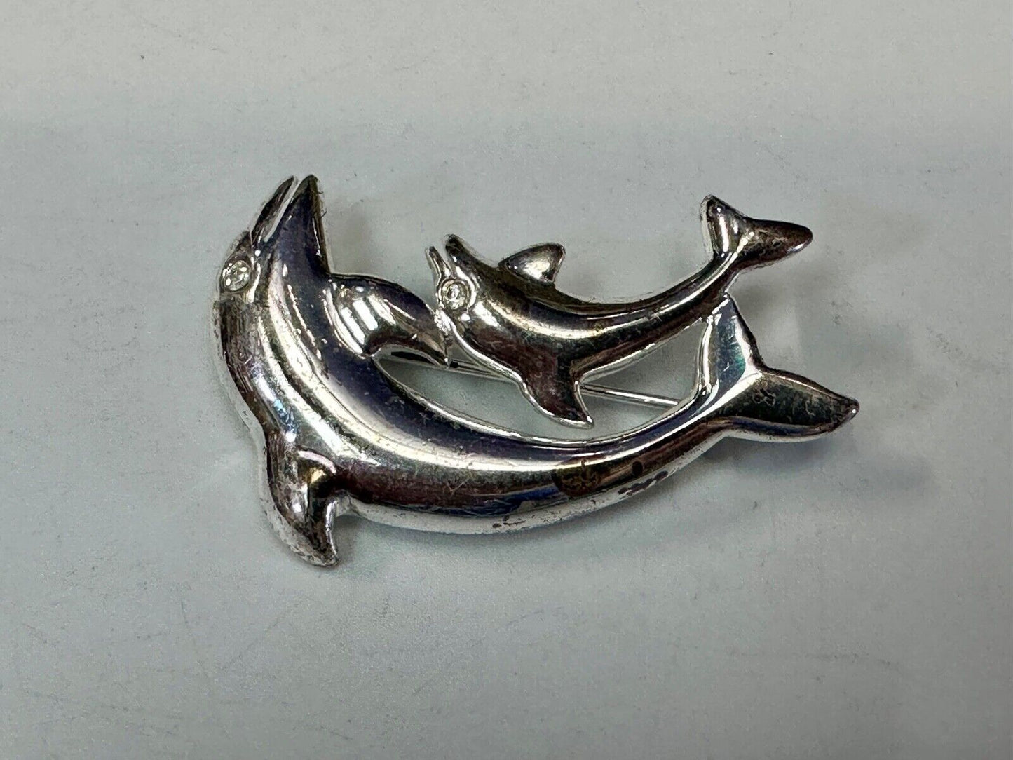 Two Dolphins Curved Jumping in ocean scene AK Anne Klein Brooch Pin