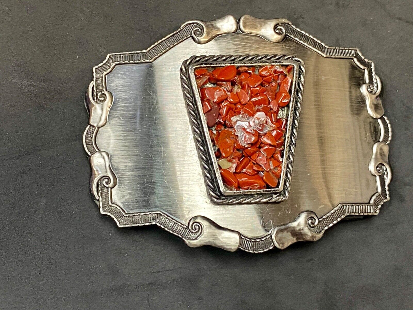 Vintage chunky red stones in centerpiece of Western Thick framed belt buckle