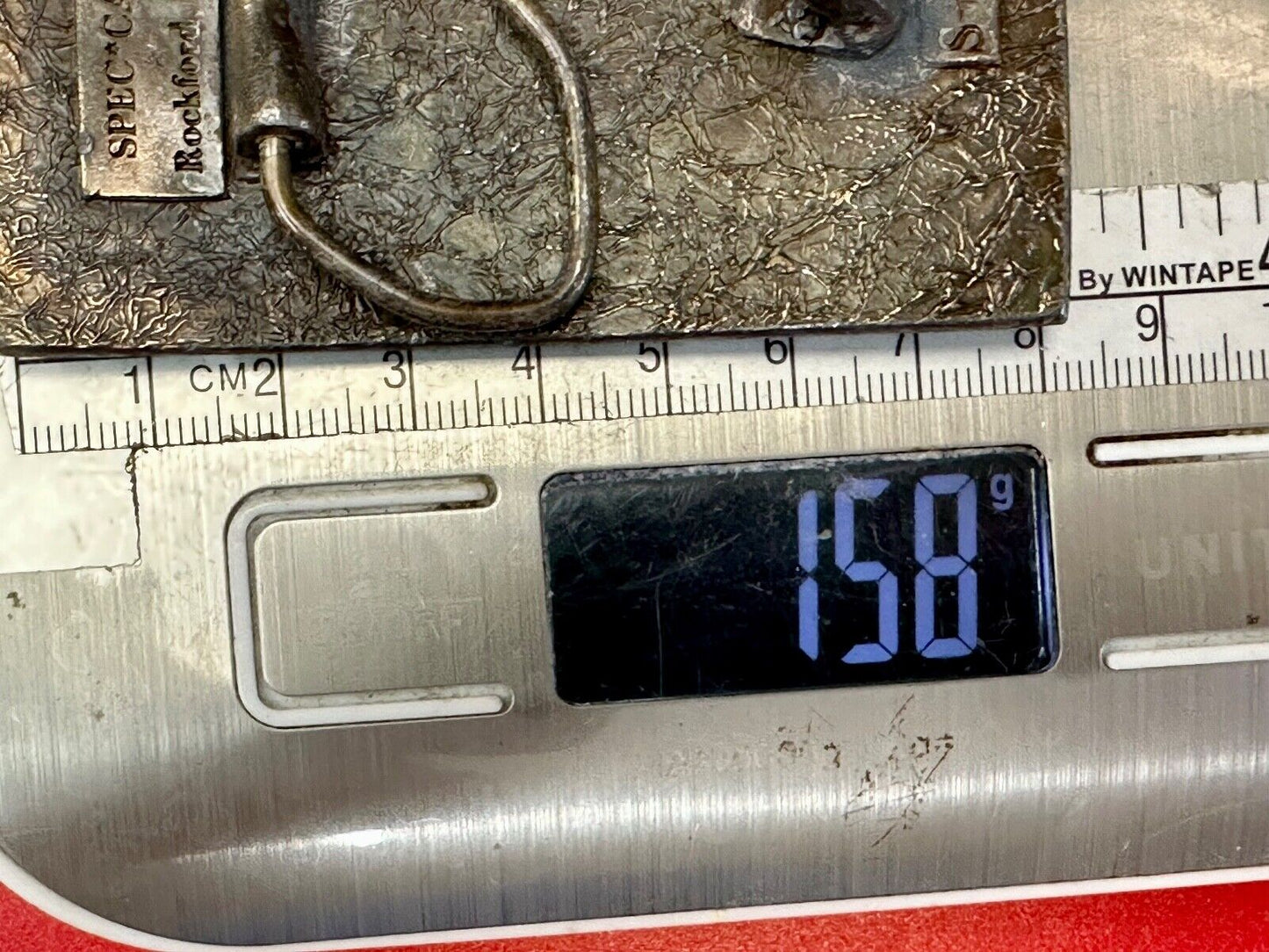 The Tough Tire Team BRi Brad Ragan, Inc. vintage belt buckle by Spec-Cast