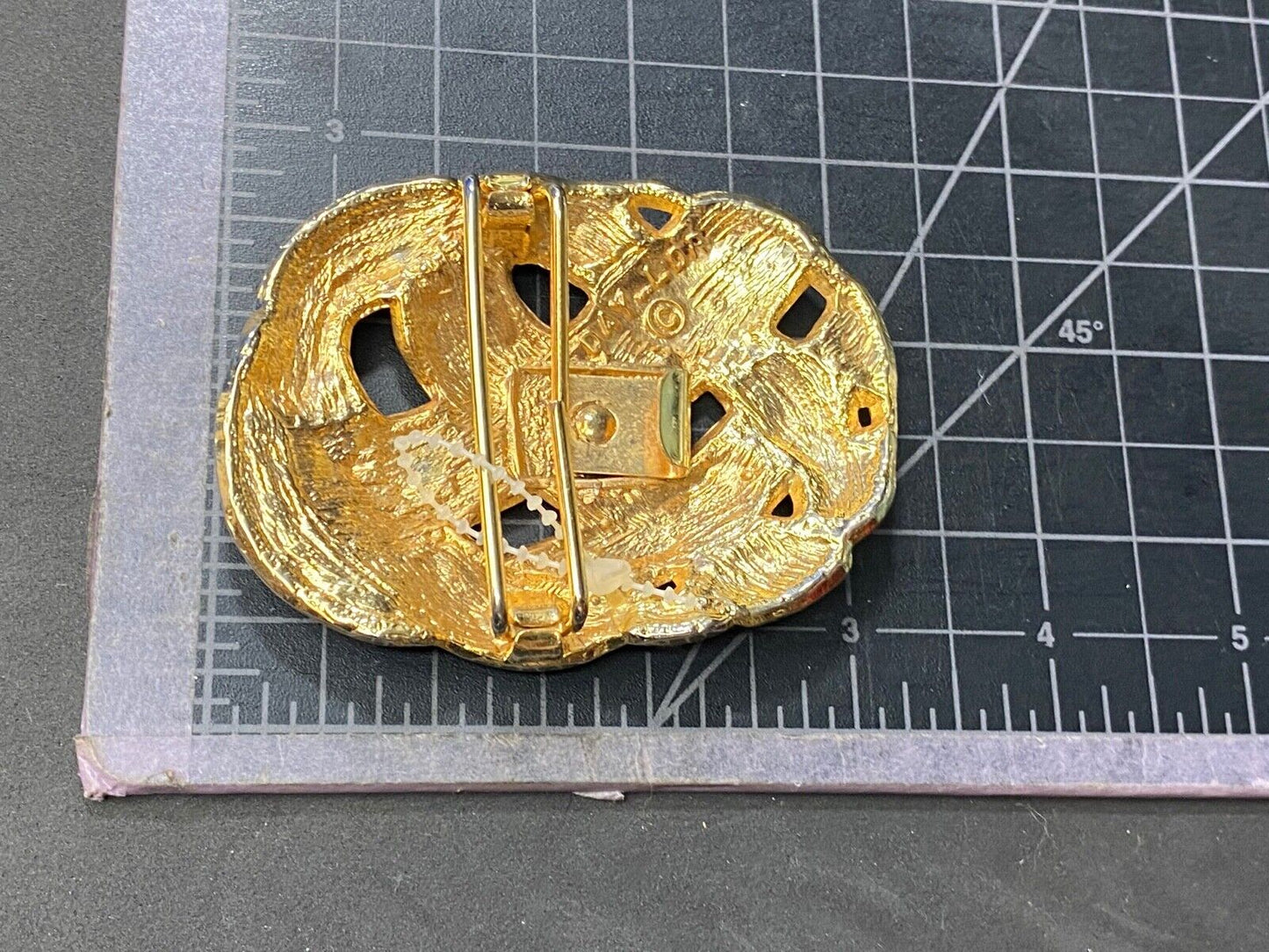 Vintage Day-Lor black and gold belt buckle