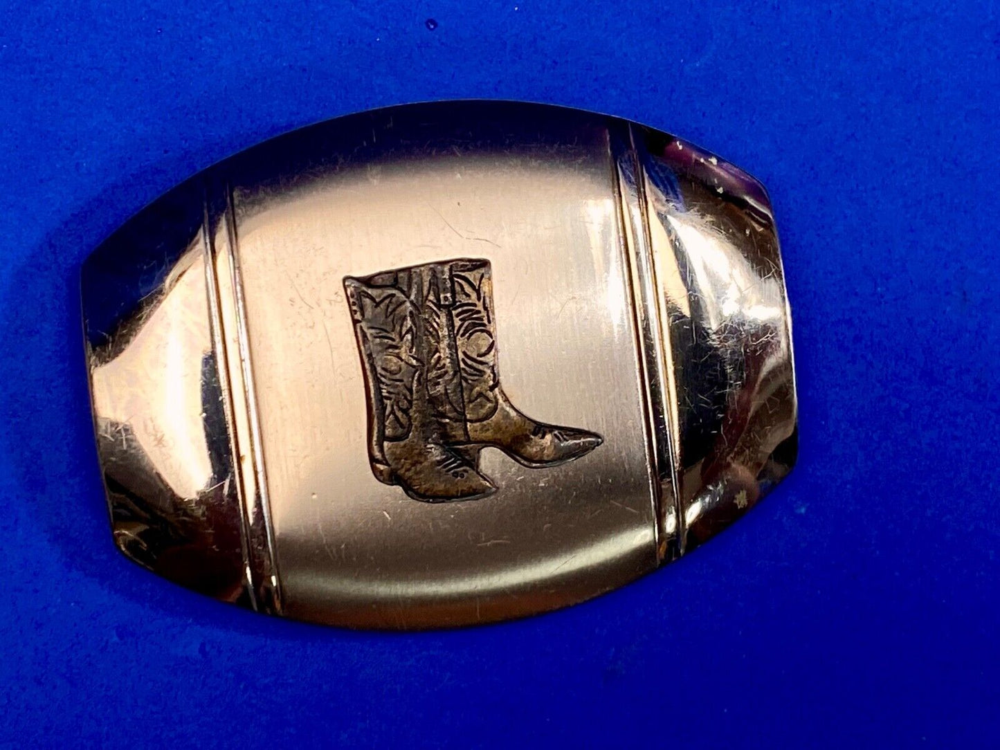 Vintage Cowboy Boots Centered On Western Oval Belt Buckle