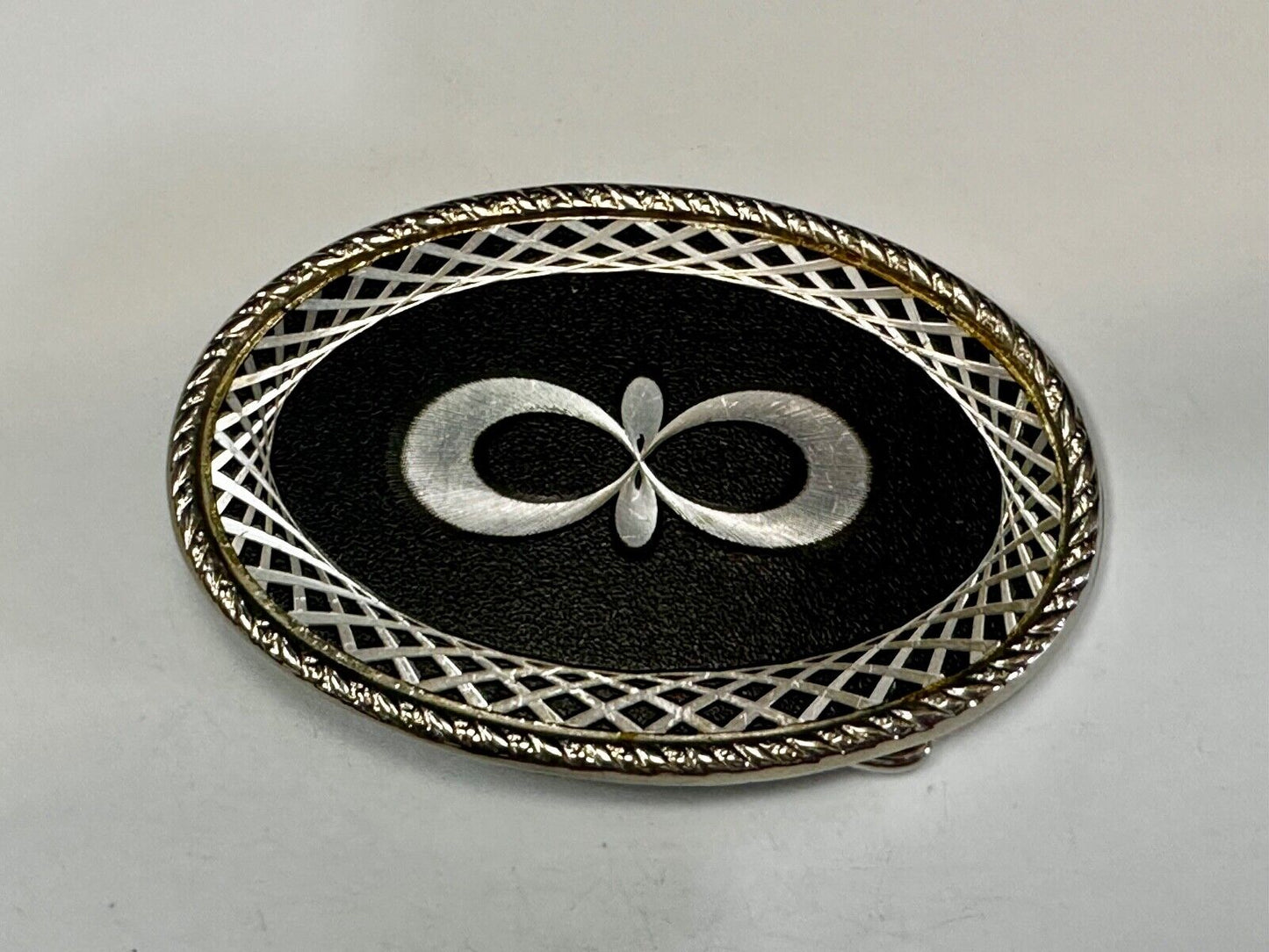 Vintage etched Figure 8 pattern on two tone Black & Silver Belt Buckle
