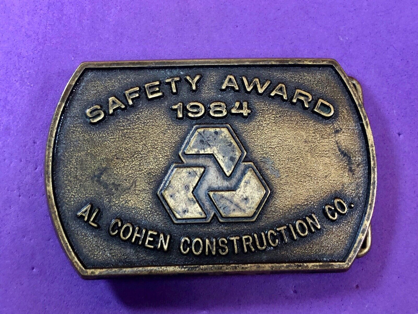 Vintage 1984 AL Cohen Construction Company promotional belt buckle safety award