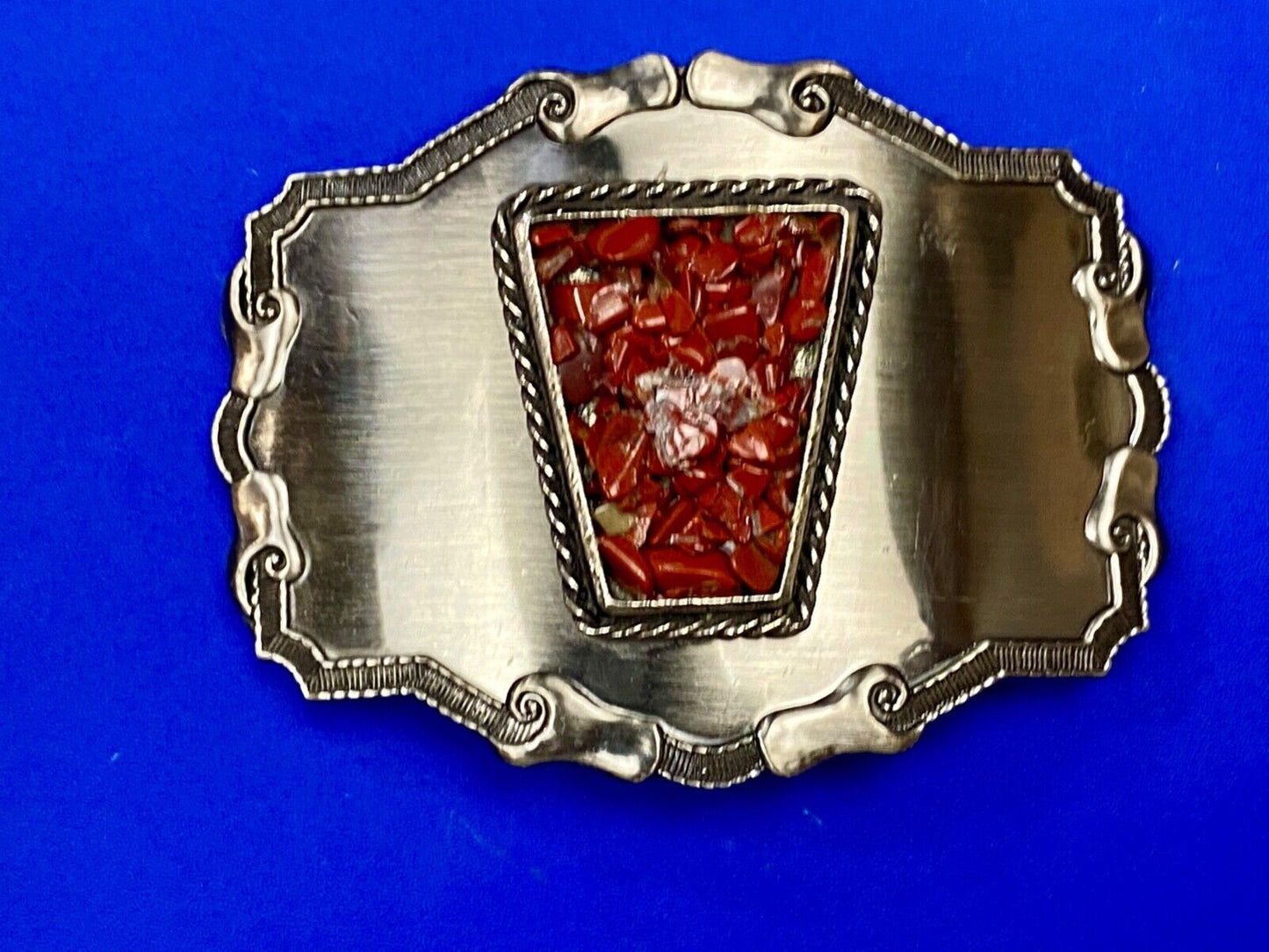 Vintage chunky red stones in centerpiece of Western Thick framed belt buckle