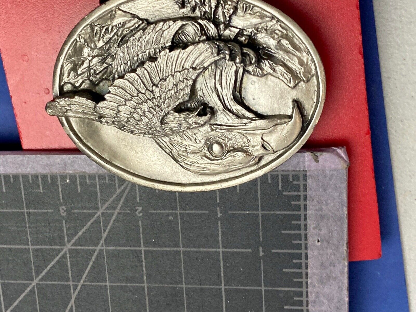 big cabin eagle head bust over mountains nature belt buckle on card