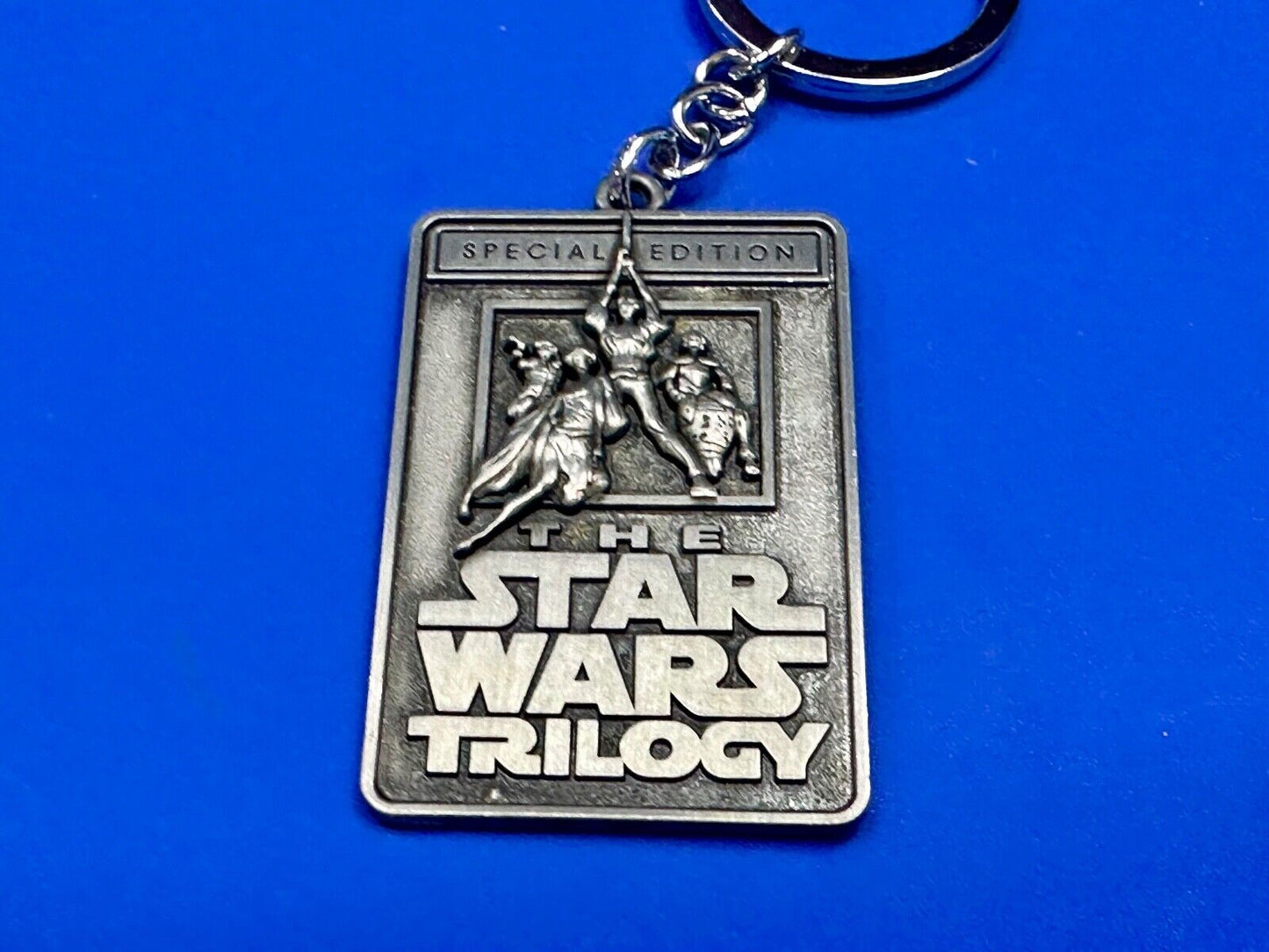 The Star Wars Trilogy Logo Emblem NOS Keychain!