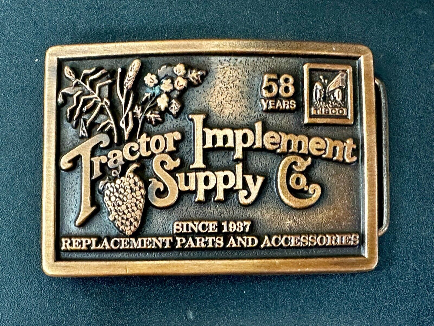 TISCO 58 Years Tractor Implement Supply Co. Since 1937 Belt Buckle by Spec-Cast