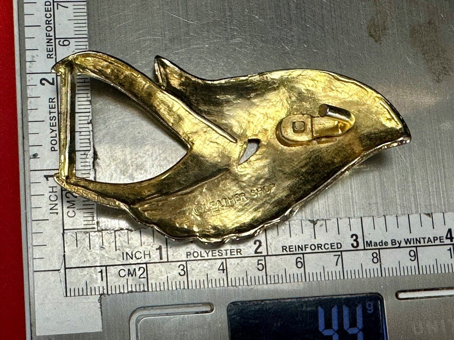 Abstract Art - Wings gold tone belt buckle signed Leather shop