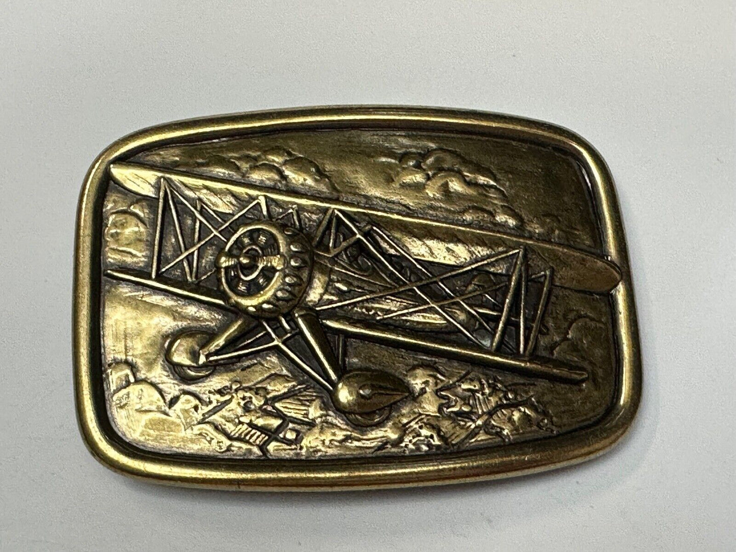 Bi-Plane Pilots Airplane brass tone Belt Buckle by Avon