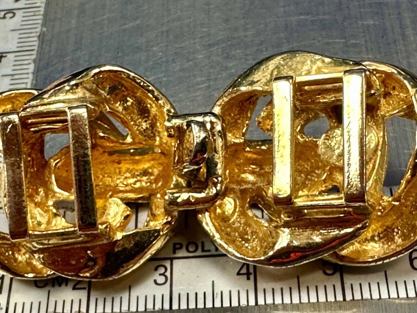 Twisted Knot's ! Two-piece interlocking gold tone Gay Boyer Vintage belt buckle