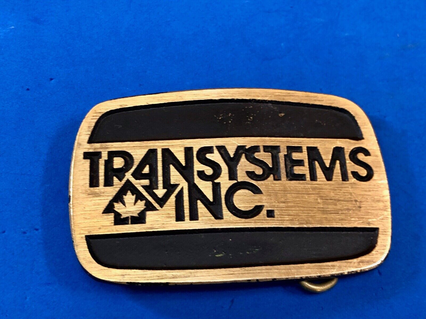 transystems inc Canada Promo belt buckle -a Construction engineering company