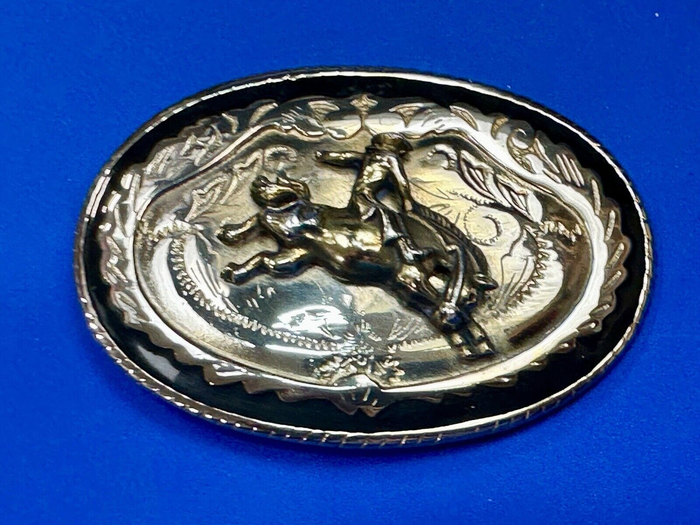 Beautiful Cowboy Saddle Bronc western black silver gold color belt buckle