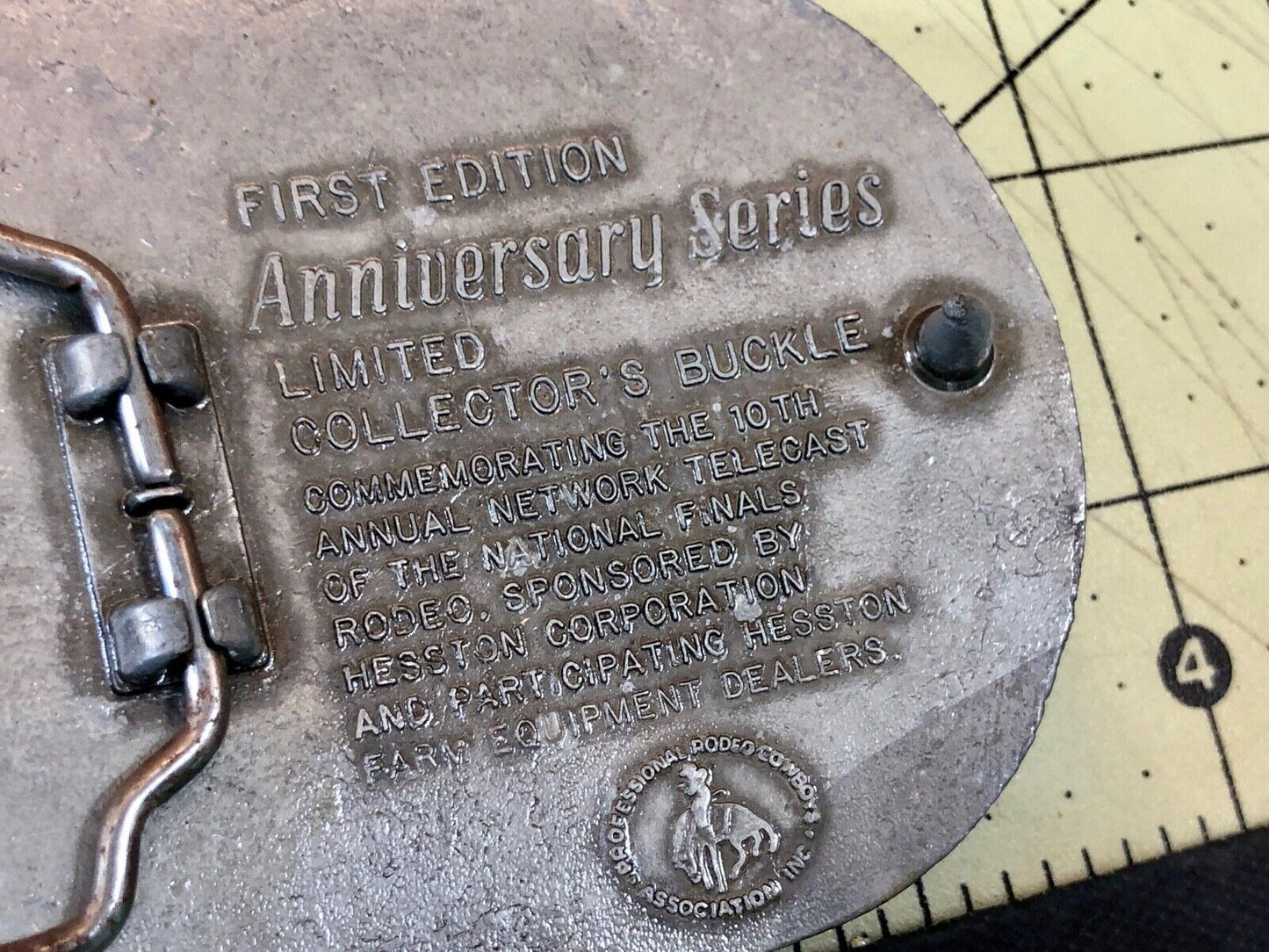 25th Anniversary 1959-1983 Hesston National Finals Rodeo belt buckle FIRST EDN.