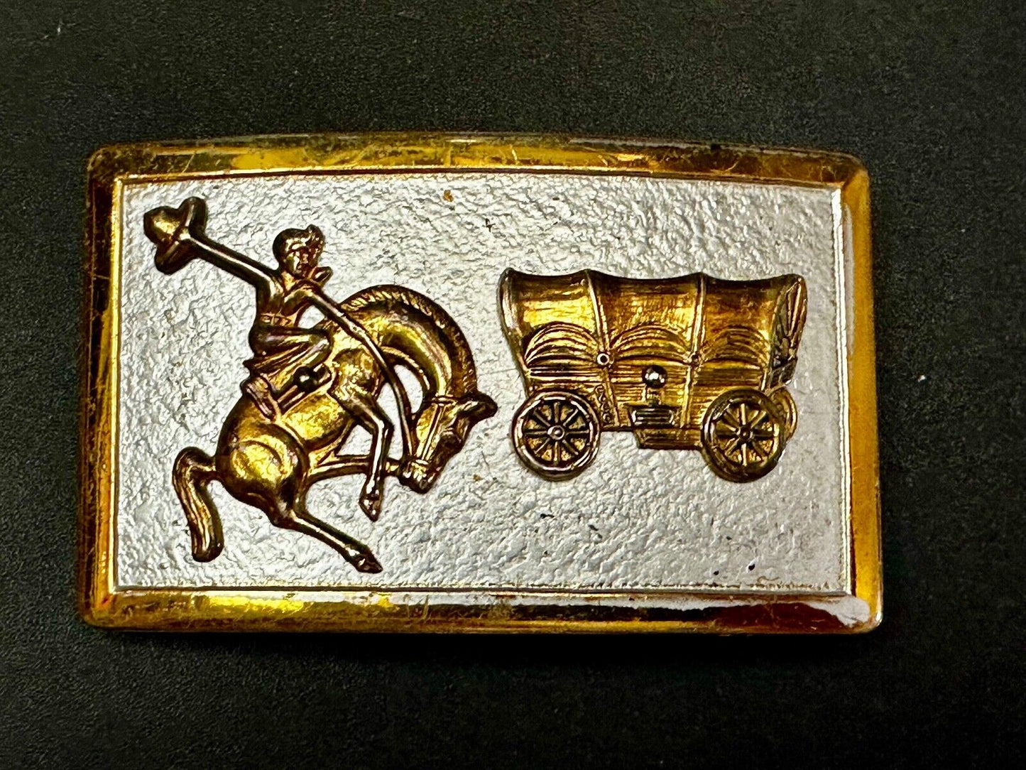Vintage Cowboy Saddle Bronc western Covered wagon gold tone belt buckle