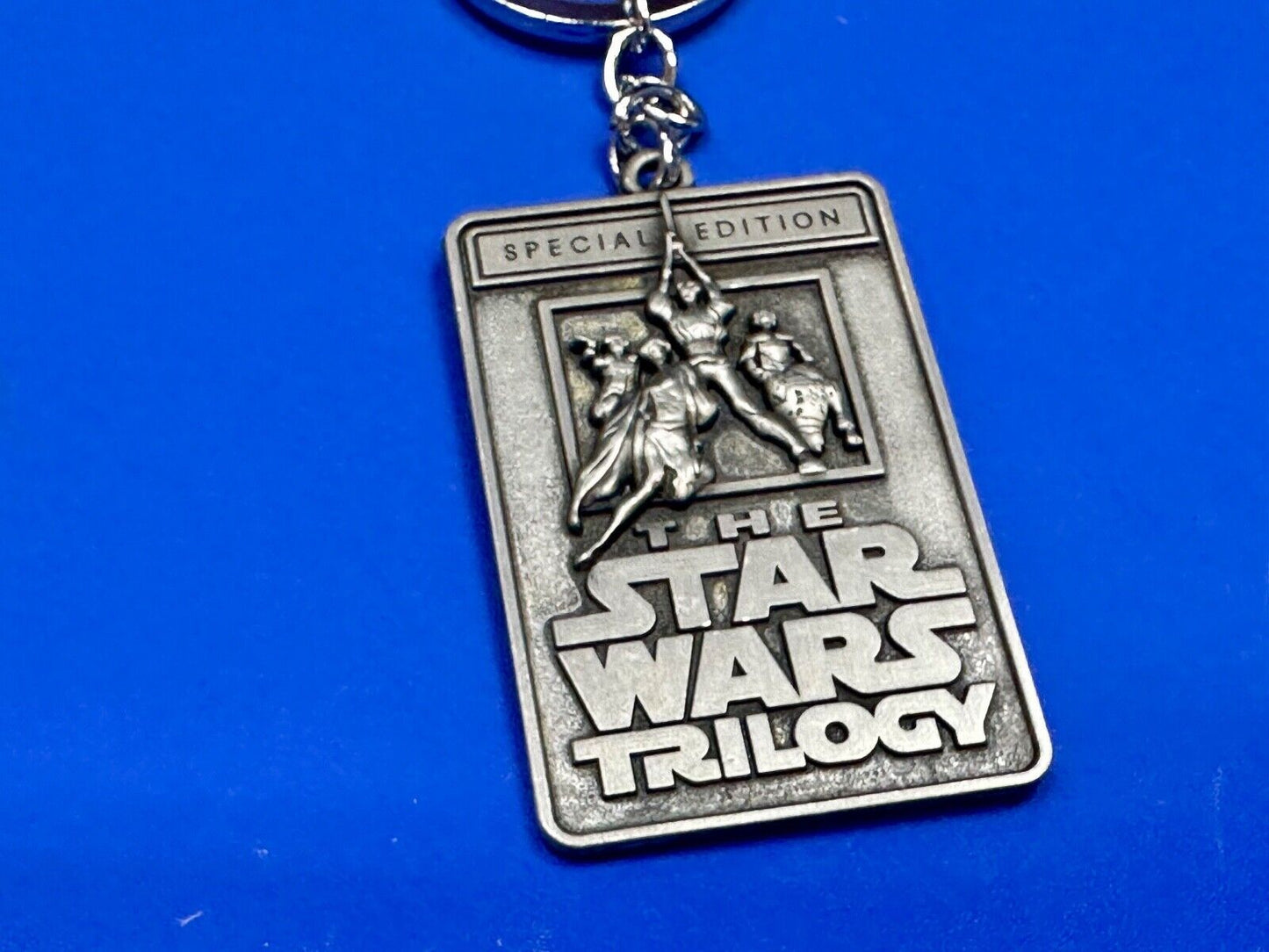 The Star Wars Trilogy Logo Emblem NOS Keychain!