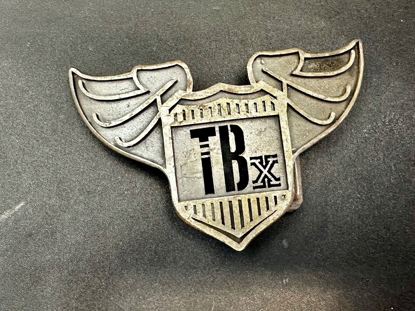 TBX Winged Bomb Vintage Silver Tone Cutout Belt Buckle